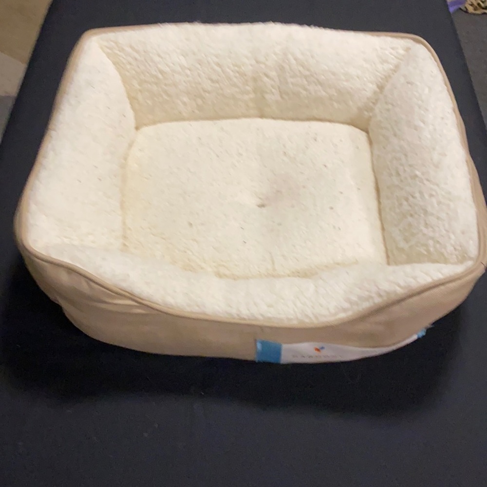 An extra small dog bed.